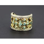 A 925 silver gilt ring set with blue topaz, (V).