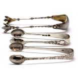 A pair of Continental .800 silver sugar tongs and two further pairs of hallmarked silver sugar