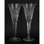 A pair of boxed Waterford crystal Millennium collection champagne glasses.
