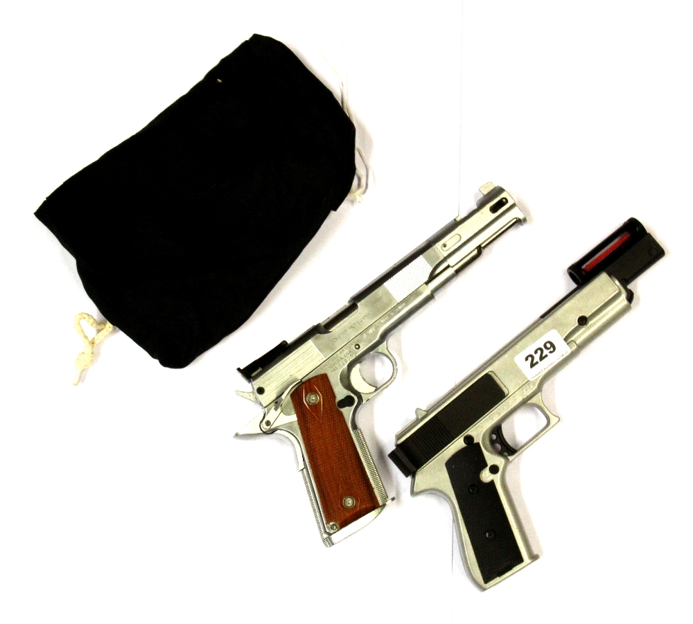 Two BB pistols.
