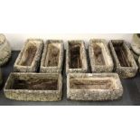 Seven vintage concrete garden trough planters, L. 59cm.