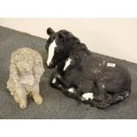 Two concrete garden animal figures, dog H. 34cm.