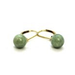A pair of 14ct yellow gold (stamped 14k) jade set drop earrings, L. 2.5cm.