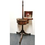 A tripod legged mahogany work stand and a cased cutlery set.