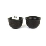 A pair of Chinese carved horn tea bowls, H. 5cm