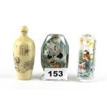 Two mid 20th century Chinese inside painted snuff bottles, together with a further snuff bottle,