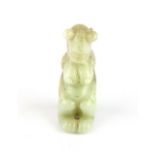 An interesting Chinese carved jade archaic form figure, H. 8.5cm.