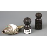 Two Tibetan carved wooden seals together with a white metal mounted conch trumpet, conch L. 15cm.