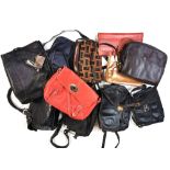 A quantity of vintage handbags.