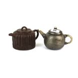 A Chinese terracotta teapot together with a pewter overlaid teapot with nephrite jade spout and
