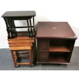 A small revolving mahogany bookcase, 64 x 64 x 64cm, together with two nests of coffee tables.