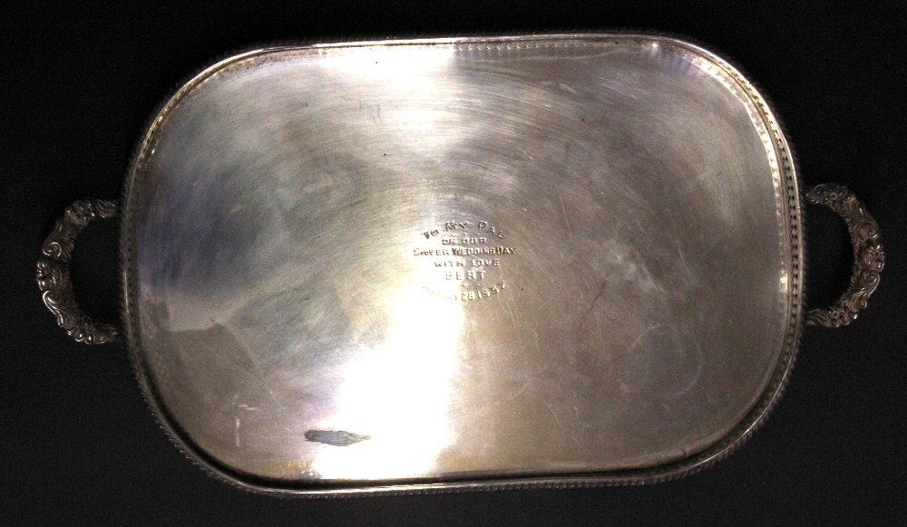 A silver plated presentation gallery tray, L. 58cm.