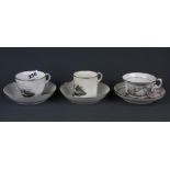 Three early monochrome decorated cups and saucers.