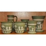 Three Wedgwood vases and two further Wedgwood pots and a jug.
