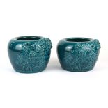 Two Chinese turquoise glazed relief decorated porcelain bowls, H. 12cm Dia. 15cm.