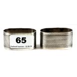 A pair of hallmarked silver napkin rings.