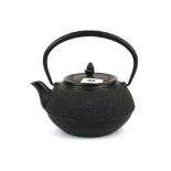An early 20th Century Chinese cast iron teapot, H. 20cm L. 20cm.