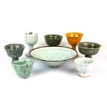 Six Chinese porcelain stem cups, a small porcelain bowl and an incised porcelain dish, tallest H.