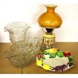 A large pressed glass vase and pressed glass bowl with a ceramic fruit bowl and oil lamp, lamp H.