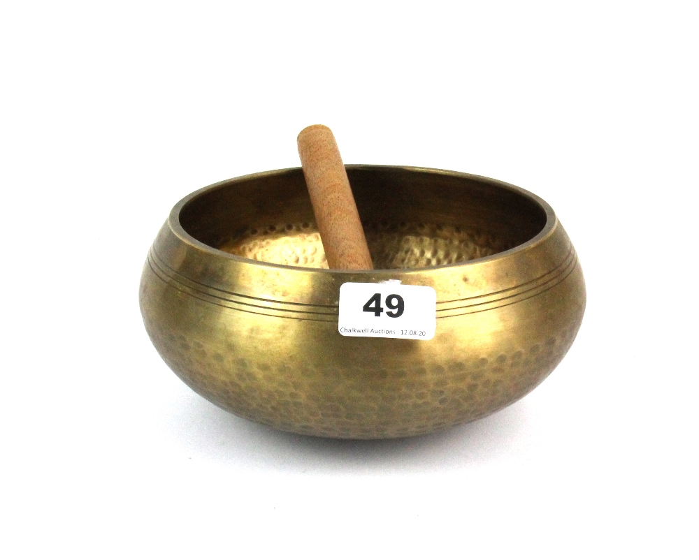 A large Tibetan bronze singing bowl, Dia. 20cm.