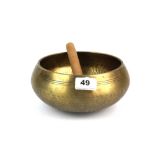 A large Tibetan bronze singing bowl, Dia. 20cm.