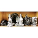 A collection of resin dragon figures, tallest 25cm.