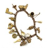 A 9ct yellow gold charm bracelet, L. 20cm.