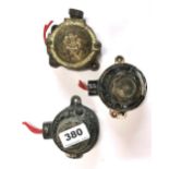 Three early electrical power switches.