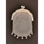 A French white metal (tested silver) chain mail purse with an inside purse, L. 8cm.