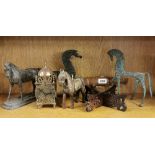 A spelter horse, a brass lantern clock and other items.