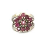 A 925 silver ring set with rubies and marcasite, (Q).