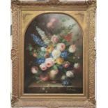 A large 20th century gilt framed oil on canvas still life flowers signed Paul Nash. Frame size 92