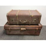 A vintage leather trunk, 82 cm x 28 x 43cm together with a further canvas trunk.