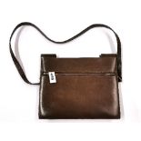 A vintage Christian Dior brown leather hand bag.