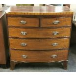 A Georgian bowfront mahogany chest of drawers, W. 96cm. H91.