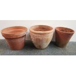 Three large terracotta plant pots, largest 46 x 36cm, (one a/f).