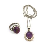A 925 silver purple stone set ring, together with a matching pendant and chain.