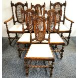 A set of six cane backed oak barley twist dining chairs, including two carvers.