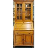 An attractive pine bureau bookcase, W. 89cm, H. 199cm.