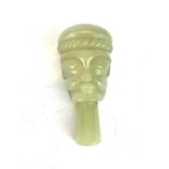 A lovely Chinese carved nephrite jade mask amulet, H. 7cm, W. 3.5cm, D. 3cm.