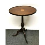 A small inlaid mahogany wine table, W. 36cm, H. 52cm.