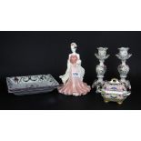 A Coalport figurine, together with a Spode box and cover, a pair of German porcelain candlesticks