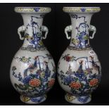 A pair of Chinese hand painted porcelain vases, H. 40cm.