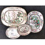 Four Indian tree pattern meat plates, W. 52cm.