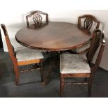 A circular pine pedestal dining table with plate glass top and four pine chairs, table Dia. 150cm.