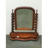 A 19th Century turned mahogany dressing mirror, H. 60cm.