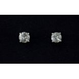 A pair of 18ct white gold (stamped 750) diamond set stud earrings approx. 0.80ct.