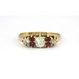 An antique 18ct gold diamond and ruby set ring ( Q )