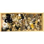 A tray of mixed vintage buttons.