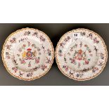A pair of 19th Century French armorial decorated porcelain plates, Dia. 25cm.